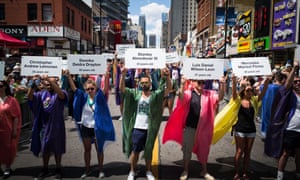 Toronto Pride participants display the names of the Orlando shooting victims.