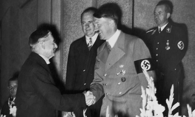 Adolf Hitler shakes hands with Neville Chamberlain  in Bad Godesberg