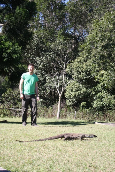 Nick Casewell and a goanna eye each other cautiously.
