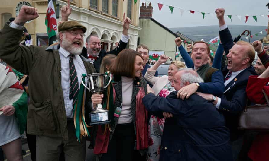 The syndicate celebrates in Dream Horse. Toni Collette, centre holding cup, plays Jan Vokes.