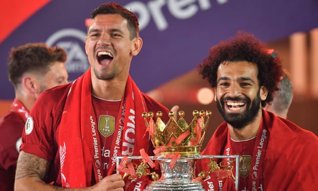 Dejan Lovren with Liverpool teammate Mohamed Salah at the Premier League trophy presentation at Anfield.
