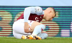 Ross Barkley clutches his hamstring.