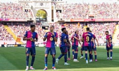 Lamine Yamal and Raphinha dance in celebration on the pitch