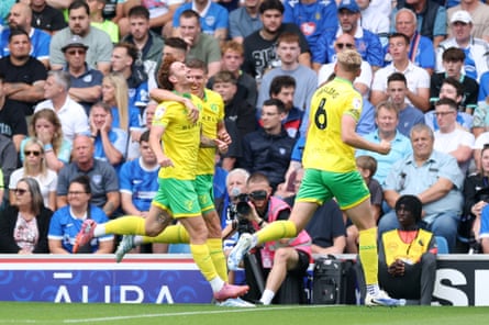 Norwich’s Josh Sargent (left) celebrates scoring their 2nd extremity astatine Portsmouth