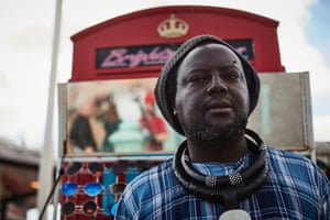 Abo Fall at his phone-box stall, Brighton marina