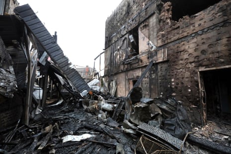 Two private houses that caught fire as a result of a Russian attack in the Darnytskyi district of Kyiv, Ukraine, on 27 December 2025.