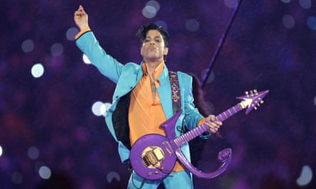 Prince performs during the half-time show of the Super Bowl in 2007.