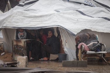Displaced civilians in Gaza shelters in their tent
