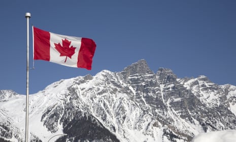 Canada flag in mountains