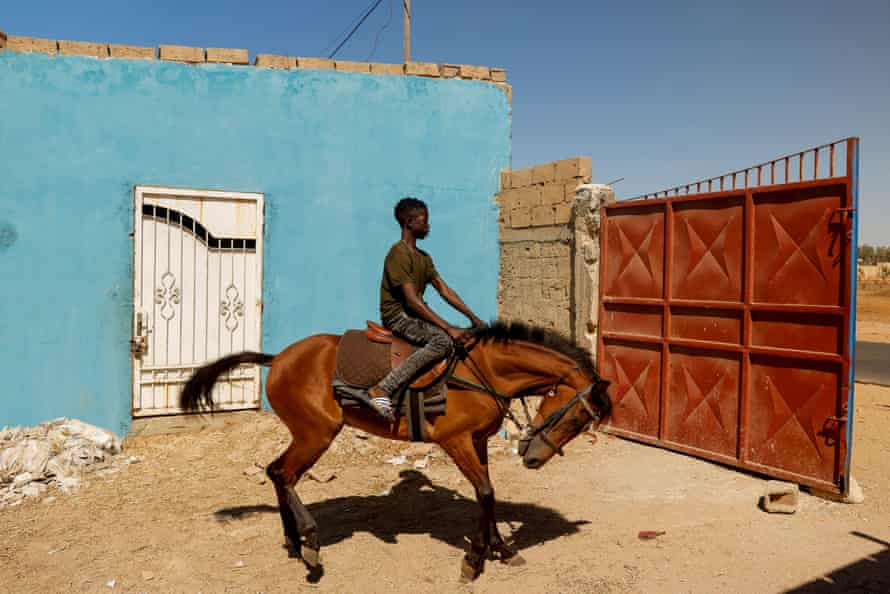 Agency photographer of the year – 2021 shortlist | World news 7 Fallou Diop, 19, a jockey, rides a young mare called Raissa Betty, in Niaga, Rufisque department, Senegal, 27 January 2021.
