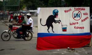 A free-standing mural in Port-au-Prince expresses Haitian anger at UN peacekeepers. The words in Creole read, from left, clockwise: Homosexual, rapists, robber, killer, kidnappers and cholera.