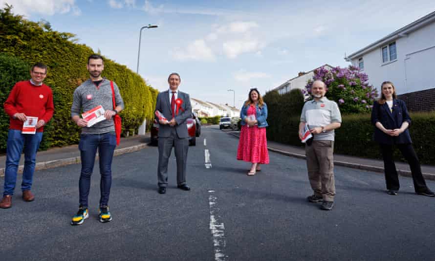 The leader of the Labour group in Bridgend, Huw David, left, with other candidates canvassing in Bridgend, Wales.