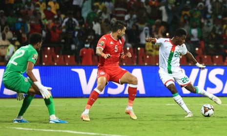 Burkina Faso's Dango Ouattara fires home to score the opening goal of the game with the last kick of the first half.