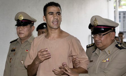 Bahraini football player Hakeem al-Araibi being arrested in Bangkok.