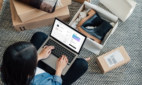 Overhead View Of Young Woman Doing Online Shopping With Laptop