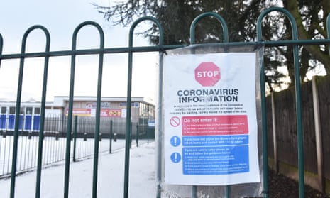 A coronavirus sign displayed outside a primary school in Newcastle-under-Lyme, Staffordshire
