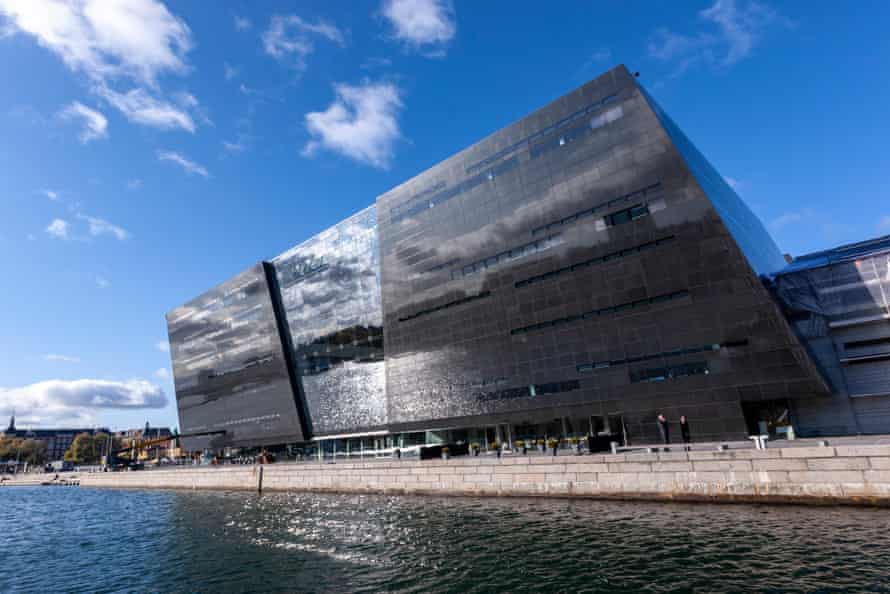 Water reflected in the Mutoko granite façade of the Black Diamond extension at the Royal Danish Library, Copenhagen.