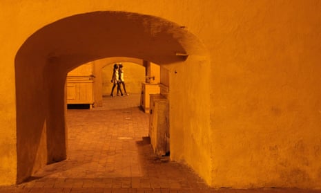 Sex workers walk in the square of the old city in Cartagena, where authorities have cracked down on a trafficking ring.