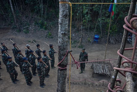 Chin National Defence Force (CNDF) soldiers practise drills at a training facility under the direction of a soldier recently defected from the Tatmadaw in Falam