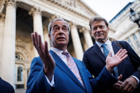 Reform UK leader Nigel Farage (L) and Reform UK deputy leader Richard Tice (R) speak to the media outside the Bank of England, after meeting with Governor of the Bank of England,Andrew Bailey, this morning