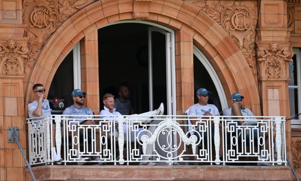 England captain Ben Stokes and head coach Brendon McCullum watch on from the pavilion.
