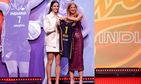 Caitlin Clark poses with the WNBA commissioner Cathy Engelbert after being selected first overall pick by the Indiana Fever during the 2024 WNBA Draft
