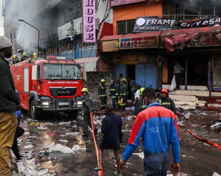 Firefighters battle to put out fires in multiple buildings in the central business district of Nairobi.