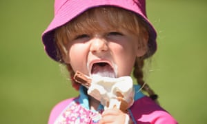 Charlotte Abercrombie, three, enjoys an ice-cream on a sunny day in Stratford-on-Avon