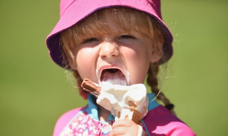 Charlotte Abercrombie, three, enjoys an ice-cream on a sunny day in Stratford-on-Avon