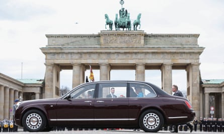 King Charles and Camilla, the Queen Consort, in a state limousine after a welcome ceremony at Brandenburg Gate in Berlin on 29 March.