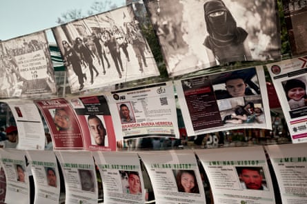 A row of black and white images of protestors above colour ‘missing’ posters featruing pictures of men and women who have disappeared.
