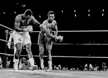 George Foreman (right) delivers a hit against Joe Frazier on the way to winning his first heavyweight title in Kingston, Jamaica, in January 1973.