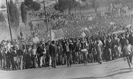 Black students demonstrate in protest against having to use Afrikaans language at school, in Soweto, in August 1976