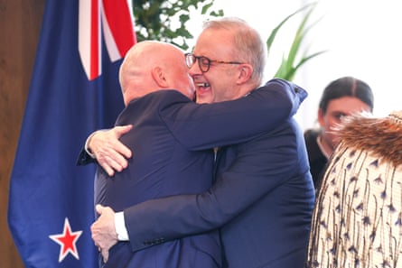 Anthony Albanese and Christopher Luxon greet each other warmly in Queenstown, New Zealand, on Saturday.