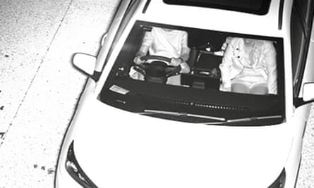 Black and white image of two women in a car