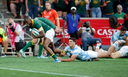 Argentina’s Santiago Carreras is powerless to stop Aphelele Fassi scoring South Africa’s third try in their 48-7 win.