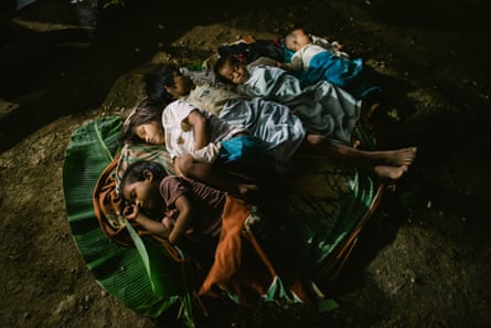 Children sleep during the farewell party of the assembly of the Wampis nation