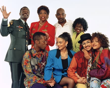 Group of eight people posing