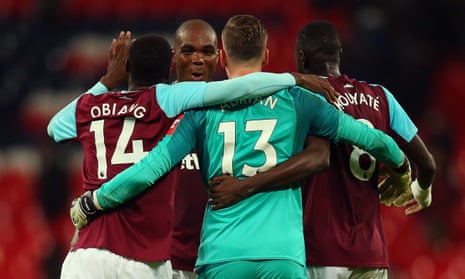 Angelo Ogbonna, who scored West Ham’s winning goal, celebrates with his team-mates after they stormed back to beat Spurs in a thrilling Carabao Cup fourth-round tie.