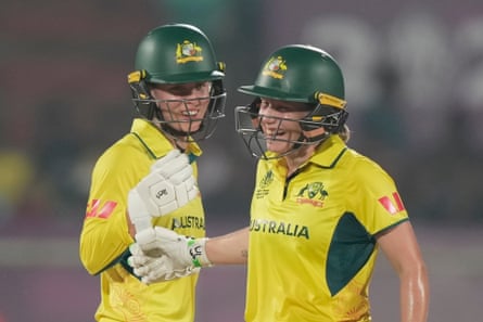 Litchfield and Healy smiling together on the pitch