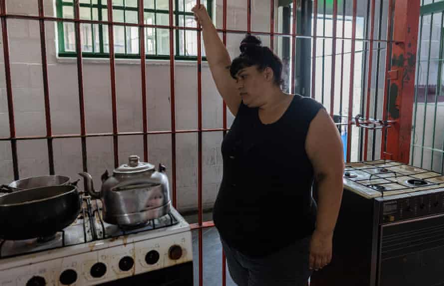 Paola, 35, cooks fried cake for her relatives who come to visit her