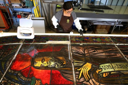 Flavie Vincent-Petit, a French glassmaker, restoring a window from the Notre Dame Cathedral.