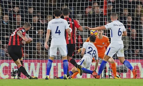 Bournemouth’s Steve Cook fires in a shot in the final minutes, but Chelsea keeper Thibaut Courtois has it covered.