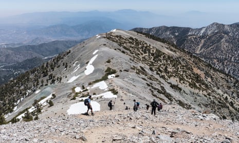 Hikers descending a mountain in California