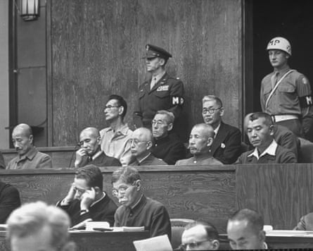 Japanese war criminals at arraignment proceedings in the former building of the Japanese ministry of war in Tokyo, 1946.