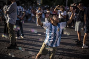 Buenos Aires, Argentina: A boy celebrates Argentina’s victory over Australia in the World Cup