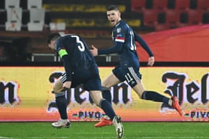 Scotland’s forward Ryan Christie (right) celebrates with Andrew Robertson after opening the scoring.