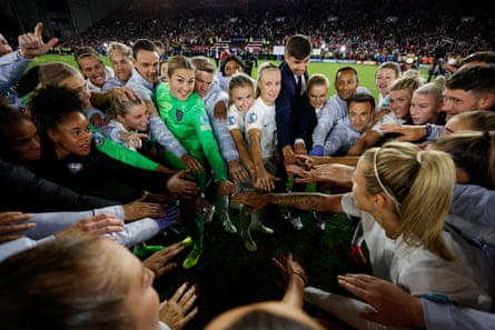 Mary Earps in a post-match huddle with her England teammates after the victory over Sweden at Bramall Lane during Euro 2022