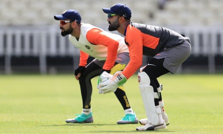Dinesh Karthik (right) and Virat Kohli at Edgbaston during India’s 2018 tour of India.