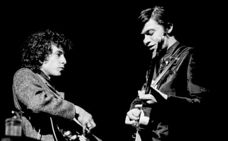 Bob Dylan (left) and Robbie Robertson on stage in February 1966